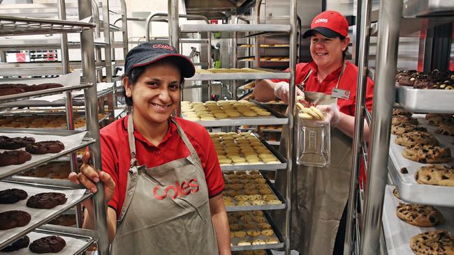 Coles supermarket is opening a new store at Ed.Square in Edmondson Park in Sydney's south west. Pictured are bakery staff Vish Shah and manager Jess Riley. Picture: Toby Zerna