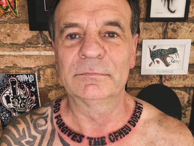 Former CFMEU boss John Setka shows off new ink with a tattoo reading, God Forgives The CFMEU Doesn’t, on his neck. Supplied