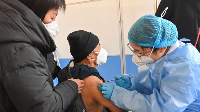 An elderly man receives a Covid-19 vaccine in Qingzhou in China's eastern Shandong province last year. Picture: AFP