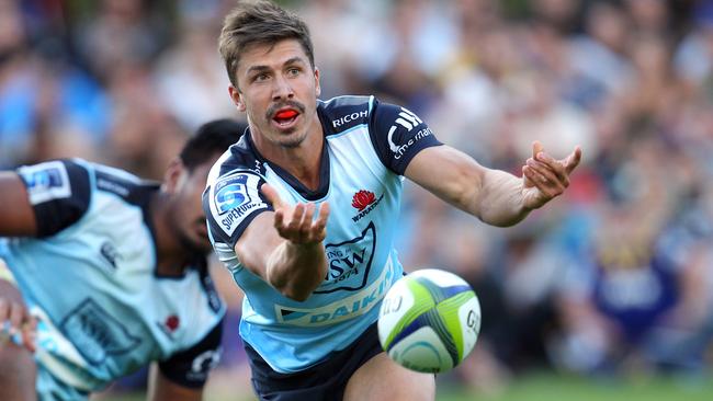 QUEENSTOWN, NEW ZEALAND - FEBRUARY 19: Jake Gordon of the Waratahs passes the ball during the Super Rugby trial match between the Highlanders and the Waratahs at the Queenstown Recreation Ground on February 19, 2016 in Queenstown, New Zealand. (Photo by Rob Jefferies/Getty Images)