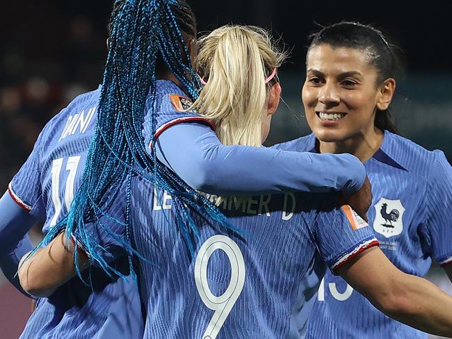 ADELAIDE, AUSTRALIA - AUGUST 08: Eugenie Le Sommer (C) of France celebrates with teammates Kadidiatou Diani (L) and Kenza Dali (R) after scoring her team's fourth goal during the FIFA Women's World Cup Australia & New Zealand 2023 Round of 16 match between France and Morocco at Hindmarsh Stadium on August 08, 2023 in Adelaide / Tarntanya, Australia. (Photo by Sarah Reed/Getty Images)