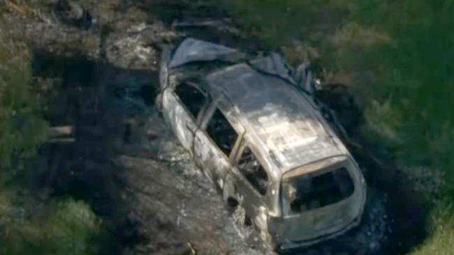 The burnt out wreckage of the car was discovered by emergency services on Sunday morning. Picture: 7 News