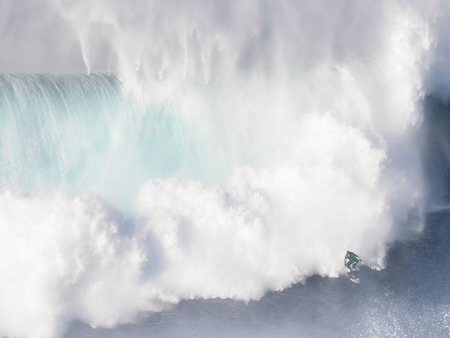 The powerful waves can push surfers deep underwater should they wipe out. Picture: AFP PHOTO / FRANCISCO LEONG