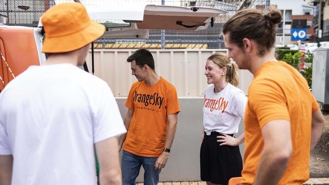 Nic Marchesi (second from left) with volunteer Laura Stokes (second from right), Lucas Patchett (right) and Oliver Wightman (left) at the Ivory St service.