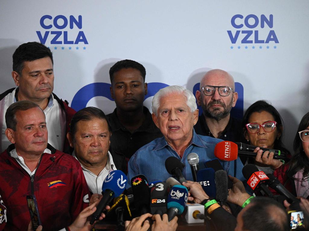 Omar Barboza, leader of the opposition party Un Nuevo Tiempo, talks to the media as he waits for the presidential election results.