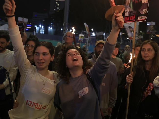 TEL AVIV, ISRAEL - JANUARY 15:  People take part in a rally calling for the return of hostages held in the Gaza Strip amid reports of a possible Gaza cease fire and hostage release deal being reached on January 15, 2025 in Tel Aviv, Israel. A ceasefire deal between Israel and Hamas was announced tonight that would entail the release of Israeli hostages held in Gaza, according to officials from Hamas, the United States, and other parties.  (Photo by Amir Levy/Getty Images)