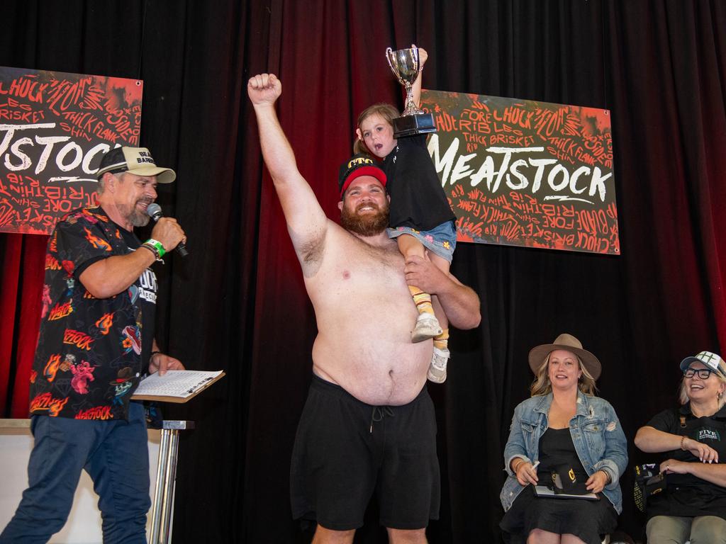 Winner of the Best Dad Body competition, Luke Billin with his daughter Madalin.Meatstock - Music, Barbecue and Camping Festival at Toowoomba Showgrounds.Saturday March 9th, 2024 Picture: Bev Lacey