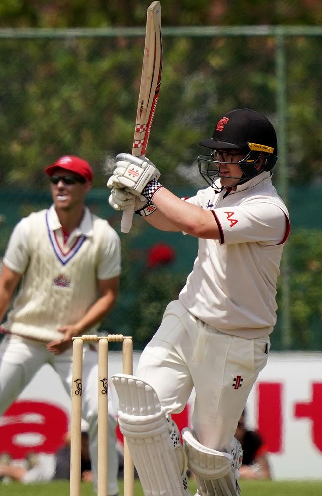 Essendon’s Aaron Ayre on the attack.