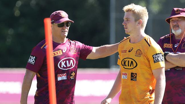 Dearden struggled to settle at the Broncos in his rookie years under coach Kevin Walters (left).