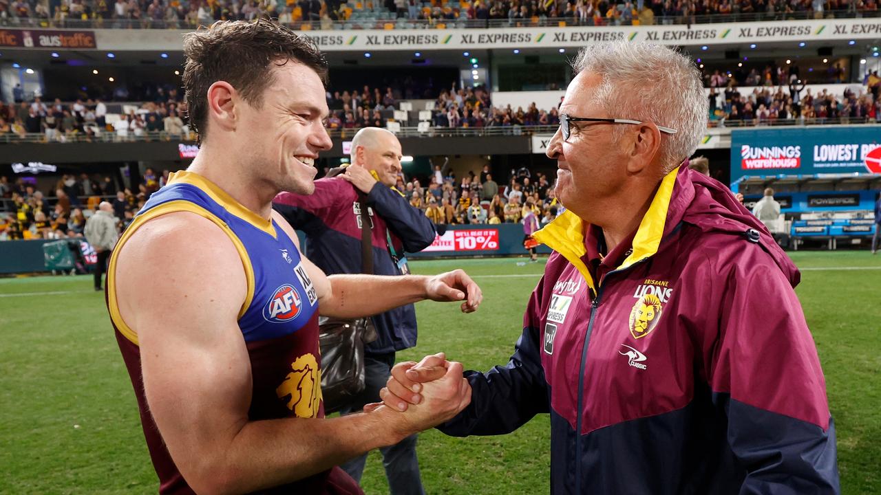 BRISBANE, AUSTRALIA - SEPTEMBER 01: Lachie Neale and Chris Fagan, Senior Coach of the Lions celebrate during the 2022 AFL Second Elimination Final match between the Brisbane Lions and the Richmond Tigers at The Gabba on September 1, 2022 in Brisbane, Australia. (Photo by Michael Willson/AFL Photos via Getty Images)