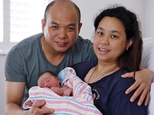 DAILY TELEGRAPH - 1.1.25First baby born in NSW this year pictured at Royal WomenÃs Hospital in Randwick this morning. Siska Apriyanti Sim holds Shawn Cedric Biansi in her bed this morning with dad Budianto also in frame.  Picture: Sam Ruttyn