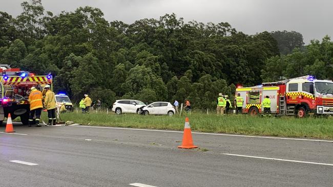 Emergency services attend a three-car crash in the northbound lanes of the Pacific Highway about 2km north of the Woolgoolga turn off on Thursday. Picture: Sandra Moon