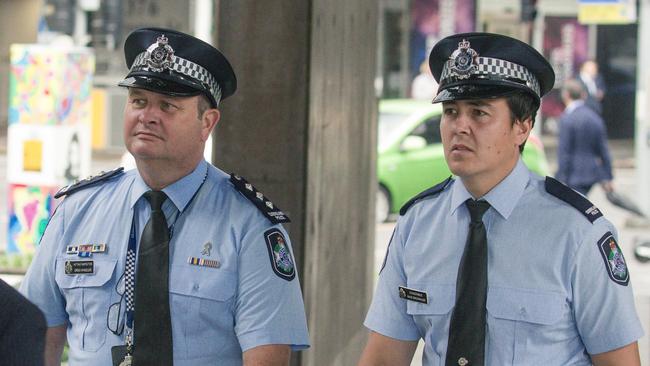 Acting Inspector Mike Wheeler and Constable Mike Brownlee arrive at the inquest in Brisbane. Picture: NewsWire / Glenn Campbell