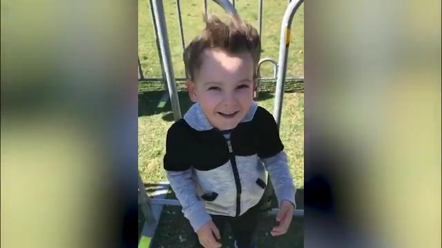 Toddler's flyaway hair illustrates just how windy is it in Sydney