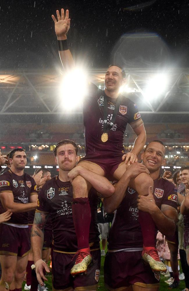 Billy Slater is chaired from the field after his final game for Queensland. (AAP Image/Dave Hunt)