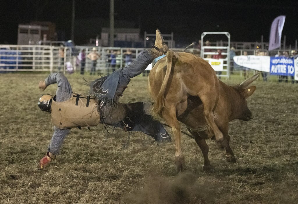 Jack McArthur comes off in the top eight chute out at the Lawrence Twilight Rodeo. Picture: Adam Hourigan