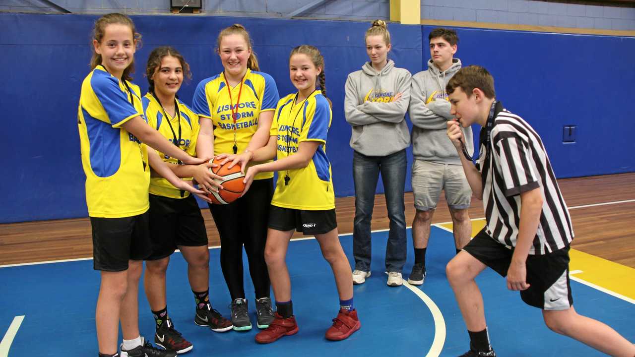 L-PLATE REFEREE: Lismore Storm Basketball Club has a new generation of referees in training - L-R Emily Simpson, 12 Jackie Andonov, 11, Jazlee Brennan, 11, and Alexis Nott, hold the ball while coaches Kiara Richardson and Jacob Leu watch, while Isaac McWhirter , 15, whistles. Picture: Alison Paterson