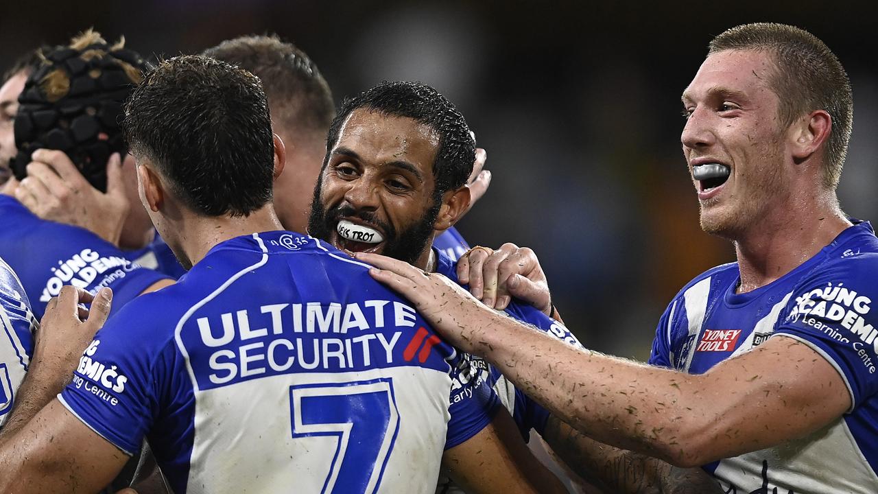 Recruit Josh Addo-Carr and the Bulldogs celebrate after winning their round one NRL match (Photo by Ian Hitchcock/Getty Images)