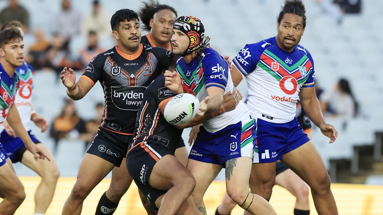 Josh Curran gets an offload away against the Tigers. Picture: Mark Evans/Getty Images