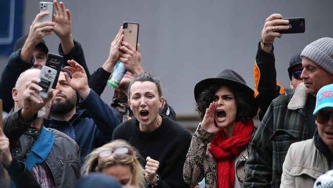 Anti-lockdown protesters gathered outside Parliament House in Melbourne.