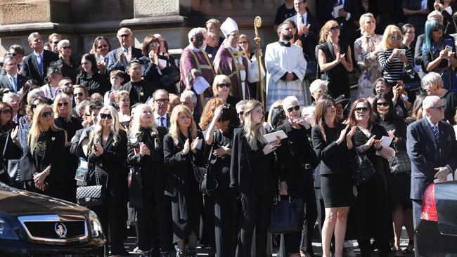 Mourners leave the state funeral for Carla Zampatti at St Mary’s Cathedral. Picture: John Grainger