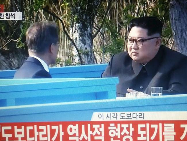 The two Korea leaders speak privately this afternoon before their announcement. Picture: Supplied