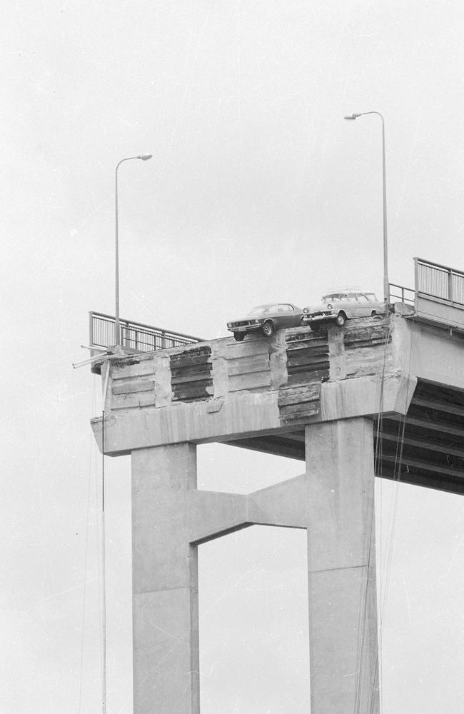 Tasman Bridge Disaster: January 1975, two cars hanging over the edge of the bridge