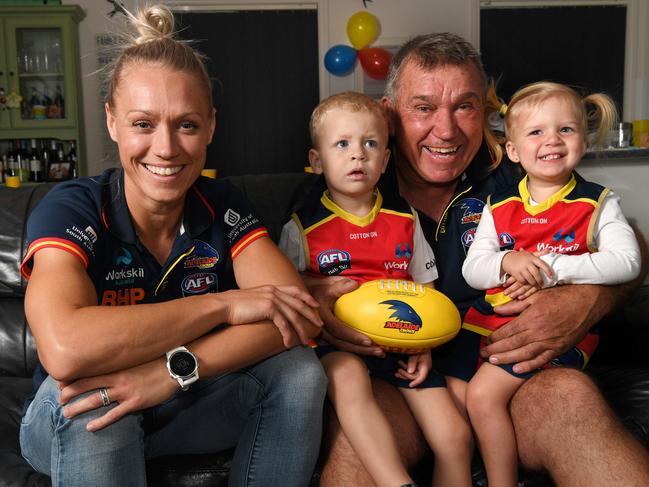 Erin Phillips is pictured with her dad and SANFL legend Greg Phillips and her twins Blake and Brooklyn. Picture: TRICIA WATKINSON