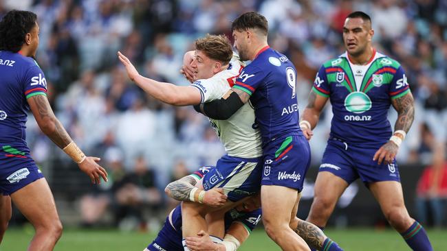 SYDNEY, AUSTRALIA - JULY 06: Max King of the Bulldogs is tackled during the round 18 NRL match between Canterbury Bulldogs and New Zealand Warriors at Accor Stadium, on July 06, 2024, in Sydney, Australia. (Photo by Matt King/Getty Images)