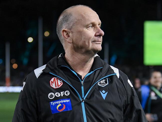 ADELAIDE, AUSTRALIA – SEPTEMBER 13: Ken Hinkley, Senior Coach of the Power walks off the ground after the AFL Second Semi Final match between Port Adelaide Power and Hawthorn Hawks at Adelaide Oval, on September 13, 2024, in Adelaide, Australia. (Photo by Mark Brake/Getty Images)