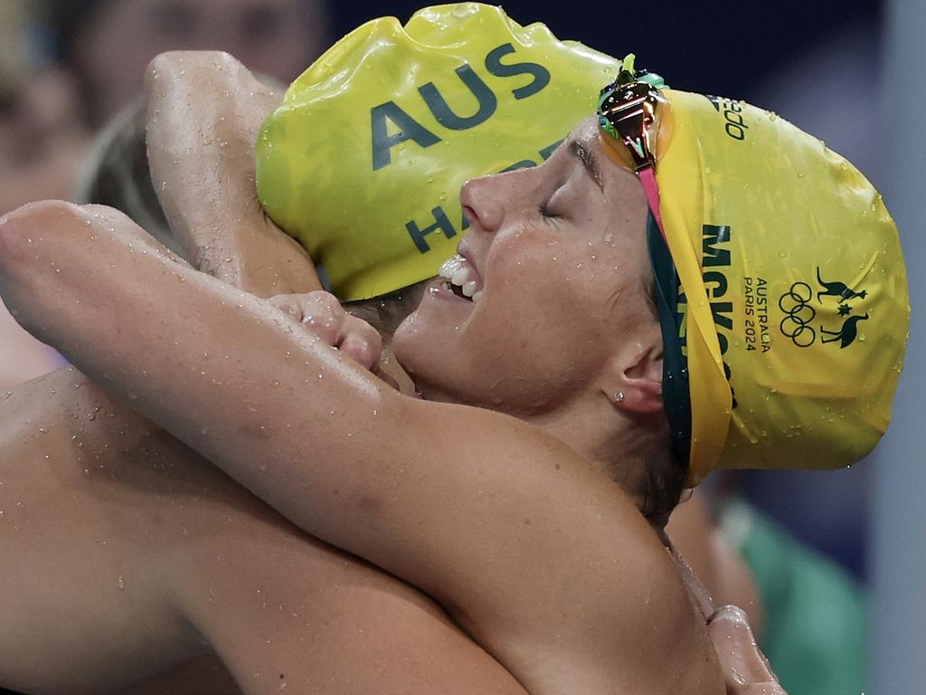 Emma McKeon celebrates with Meg Harris after Australia’s gold medal victory in the 4x100m freestyle relay at the Paris Olympic Games. Picture: Getty Images