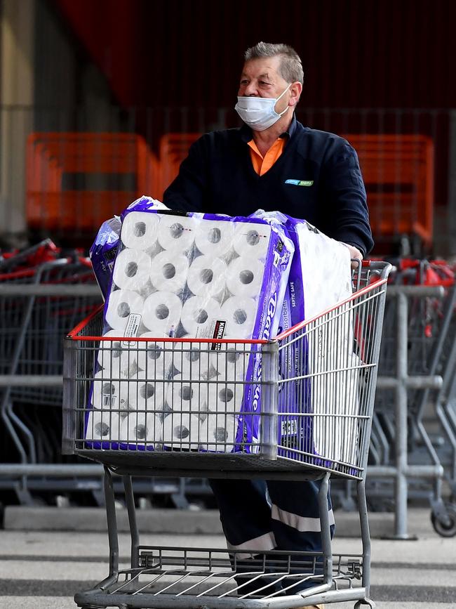 Stocking up on toilet paper before lockdown. Picture: AFP