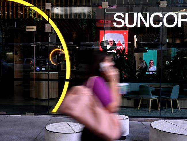 BRISBANE, AUSTRALIA - NewsWire Photos - FEBRUARY 20, 2024.People walk past a Suncorp BankÃs branch in Brisbane. A tribunal has authorised the $4.9 acquisition of SuncorpÃs banking arm by ANZ Bank. Picture: Dan Peled / NCA NewsWire