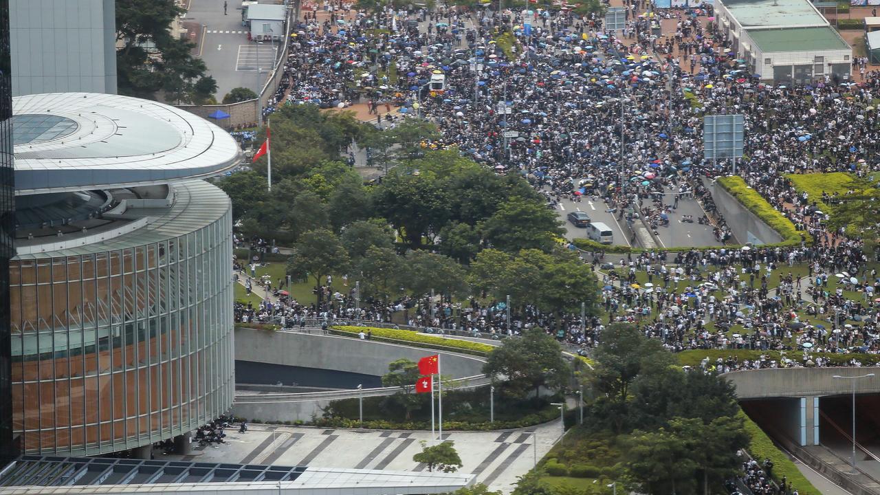 Protesters gather outside the Legislative Council in Hong Kong. Picture: Kin Cheung/AP