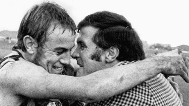 Then Woodville coach Noel Teasdale embraces Malcolm Blight after the star’s matchwinning performance (32 kicks and 18 marks) against top side North Adelaide in 1971.