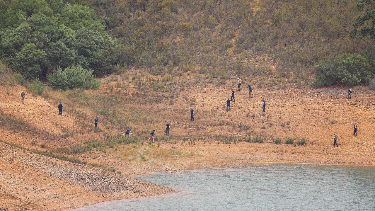 Authorities scour areas around the Arade dam, in Silves, near Praia da Luz on May 23. Picture: AFP