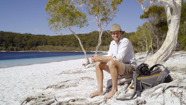 Fraser Island resident and photographr Peter Meyer on Fraser Island (K'Gari) in a scene from the documentary TV series Ocean Odyssey: A Journey Down the East Australian Current. Supplied by ABC-TV.