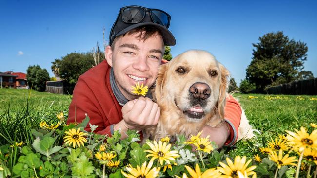 James Anderson, who used to struggle with hay fever, with his dog Archie. Picture: Tony Gough