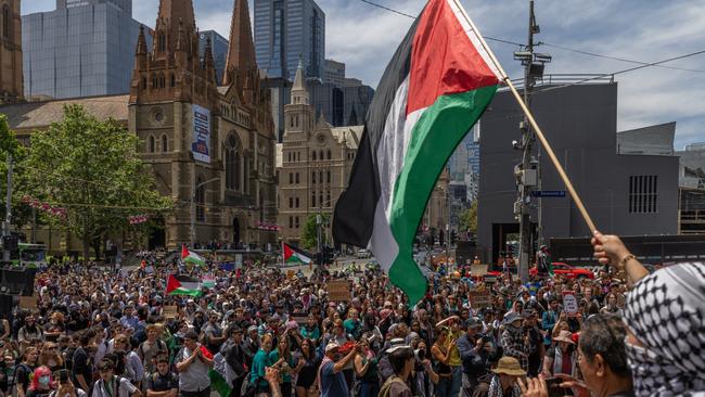 MELBOURNE, AUSTRALIA - NOVEMBER 23: Protesters gather at Flinders Street Station on November 23, 2023 in Melbourne, Australia. Organised by School Students For Palestine, the call for action on the group's social media feeds prompted a statement from federal Education Minister Jason Clare that children should be in class during school hours. The ongoing Israel-Hamas conflict continues to cause social tensions in societies around the world, including in Australian cities. (Photo by Asanka Ratnayake/Getty Images)