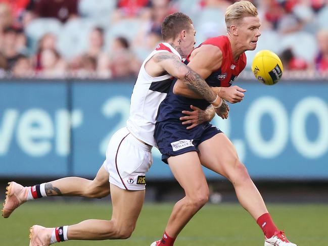 MELBOURNE, AUSTRALIA - APRIL 20: Matthew Parker of the Saints tackles Josh Wagner of the Demons during the round 5 AFL match between Melbourne and St Kilda at Melbourne Cricket Ground on April 20, 2019 in Melbourne, Australia. (Photo by Michael Dodge/Getty Images)