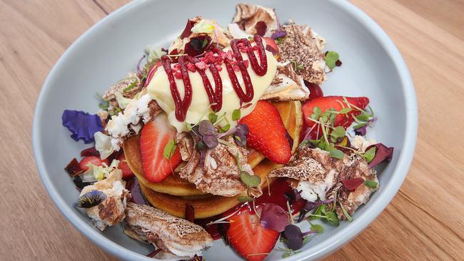 Blossom hotcakes with meringue and strawberries at Stanley in Mt Waverley. Picture: Ian Currie