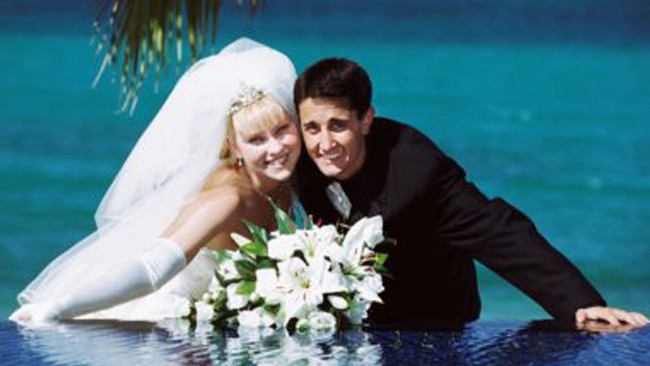 David and Tegan Crisafulli on their wedding day on Hamilton Island in 2002.