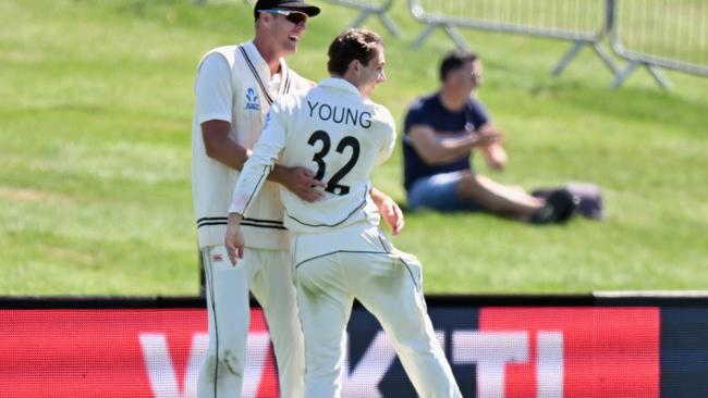 Will Young celebrates with Kyle Jamieson. Photo by Kai Schwoerer/Getty Images