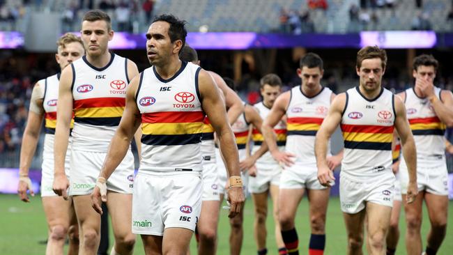 Eddie Betts leads Crows players off the field after the loss to Fremantle on Sunday. Picture: AAP Image/Richard Wainwright