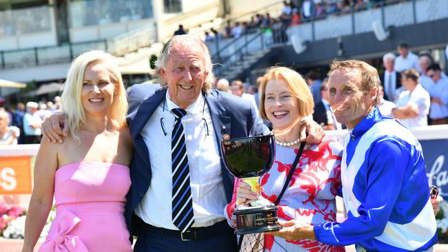 MELBOURNE, AUSTRALIA - FEBRUARY 26: Damien Oliver poses with trainer Gai Waterhouse and owner John Singleton after riding Castlereagh Kid winning Race 3, the Stow Storage Solutions Autumn Classic, during Melbourne Racing at Caulfield Racecourse on February 26, 2022 in Melbourne, Australia. (Photo by Vince Caligiuri/Getty Images)