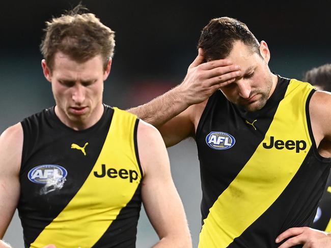 MELBOURNE, AUSTRALIA - JULY 25: Dylan Grimes and Toby Nankervis of the Tigers  look dejected after losing the round 19 AFL match between Geelong Cats and Richmond Tigers at Melbourne Cricket Ground on July 25, 2021 in Melbourne, Australia. (Photo by Quinn Rooney/Getty Images)