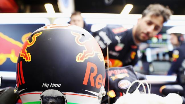 Daniel Ricciardo has a peek at his 2017 racing helmet.
