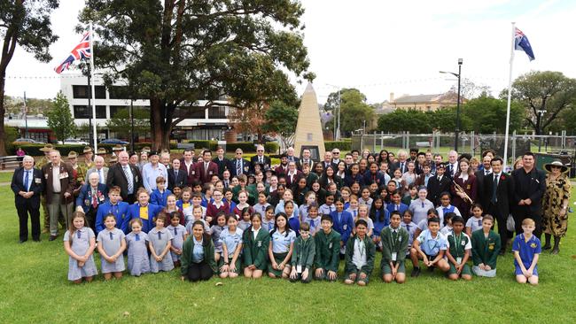 Hundreds of schoolchildren and veterans at Mawson Park on Friday. Picture: Simon Bullard)