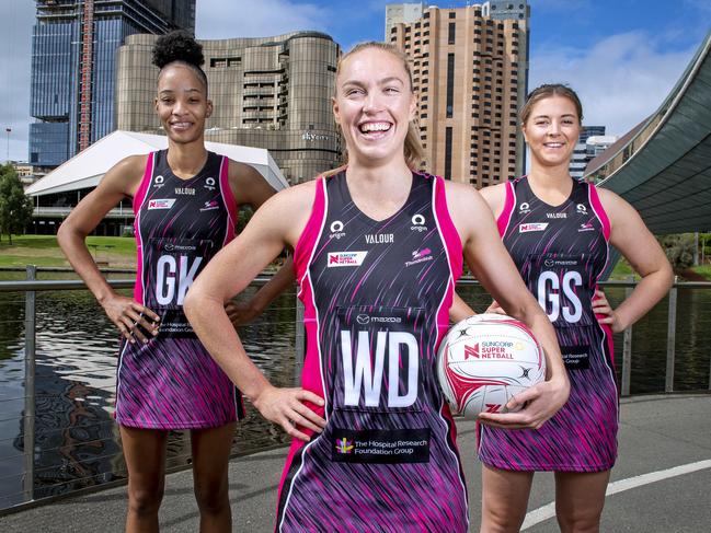 Adelaide Thunderbirds leaders Hannah Petty with Shamera Sterling and Eleanor Cardwell.