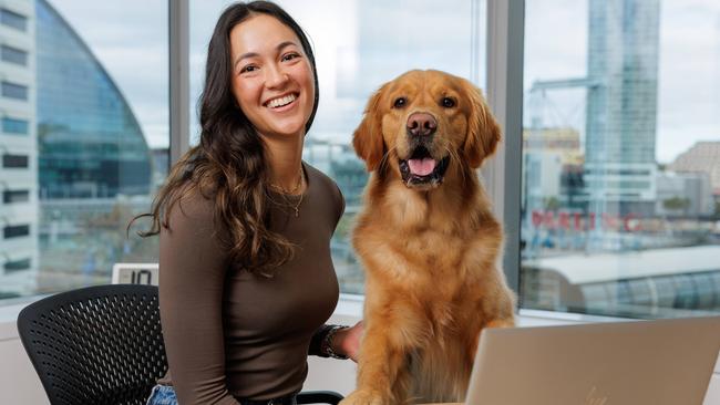 Daily Telegraph. 17, June, 2024.Jess Walker, with her dog Magnus, at work in Sydney CBD, today. (Story - Bring your Dog to work day) Picture: Justin Lloyd.